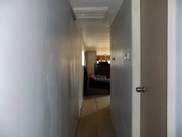 a bathroom with a glass door shower