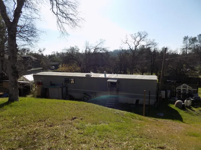 a view of a lake with a house