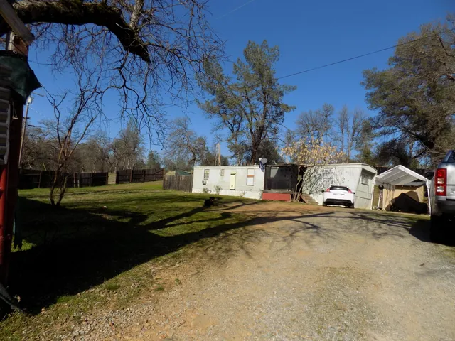 a view of street with parked cars