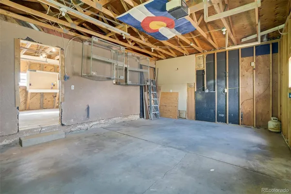 a view of an empty room with a windows