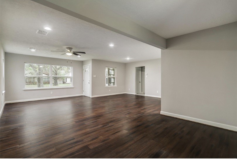 4627 Maple Street Bellaire, TX 77401 - Photo 2 of 10 THIS THOUGHTFULLY UPDATED 1950s HOME OFFERS A WELCOMING SPACE THAT IS BOTH COMFORTABLE AND REFINED.