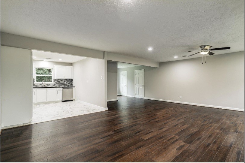 4627 Maple Street Bellaire, TX 77401 - Photo 7 of 10 FLEXIBLE LAYOUT WITH ENDLESS POSSIBILITIES—IDEAL FOR A LIVING/DINING COMBINATION, WITH AMPLE WALL SPACE FOR A NOOK, COFFEE BAR, OR ADDITIONAL DESIGN FEATURES.