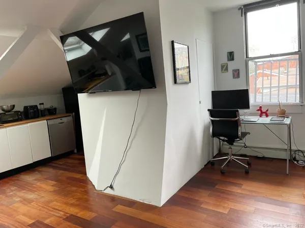 a kitchen with counter top space and cabinets