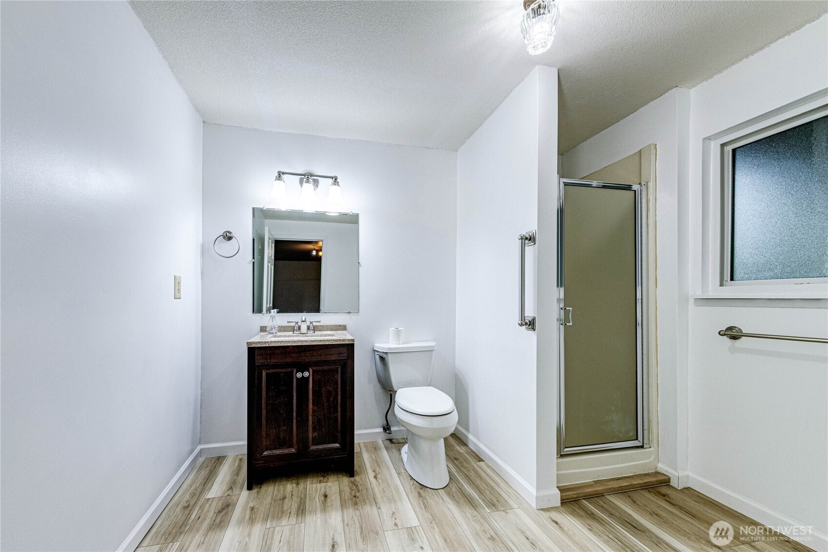 321 216th Street Southeast Bothell, WA 98021 - Photo 20 of 33 a spacious bathroom with a toilet and a sink