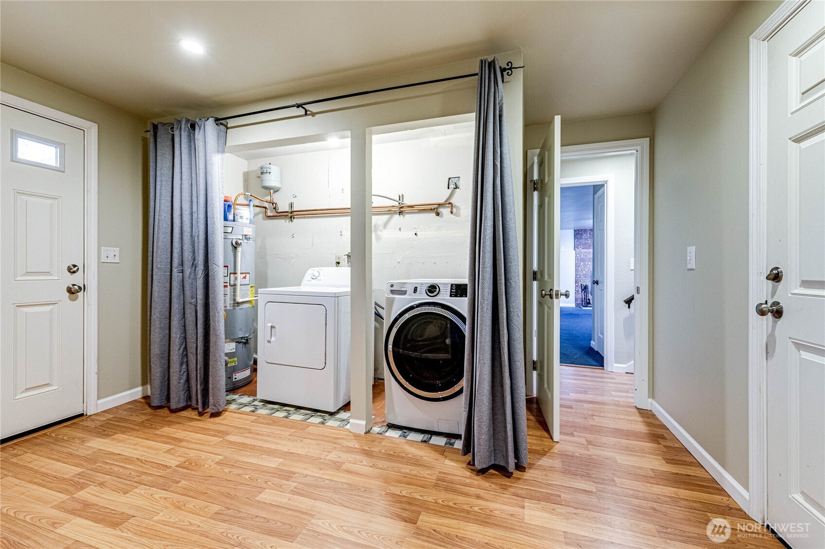 321 216th Street Southeast Bothell, WA 98021 - Photo 23 of 33 a view of a room with washer and dryer