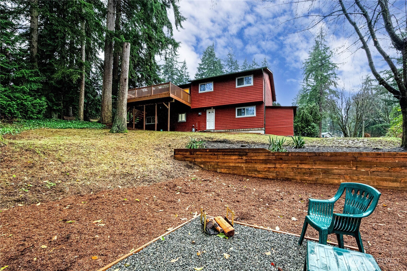 321 216th Street Southeast Bothell, WA 98021 - Photo 27 of 33 a backyard of a house with table and chairs