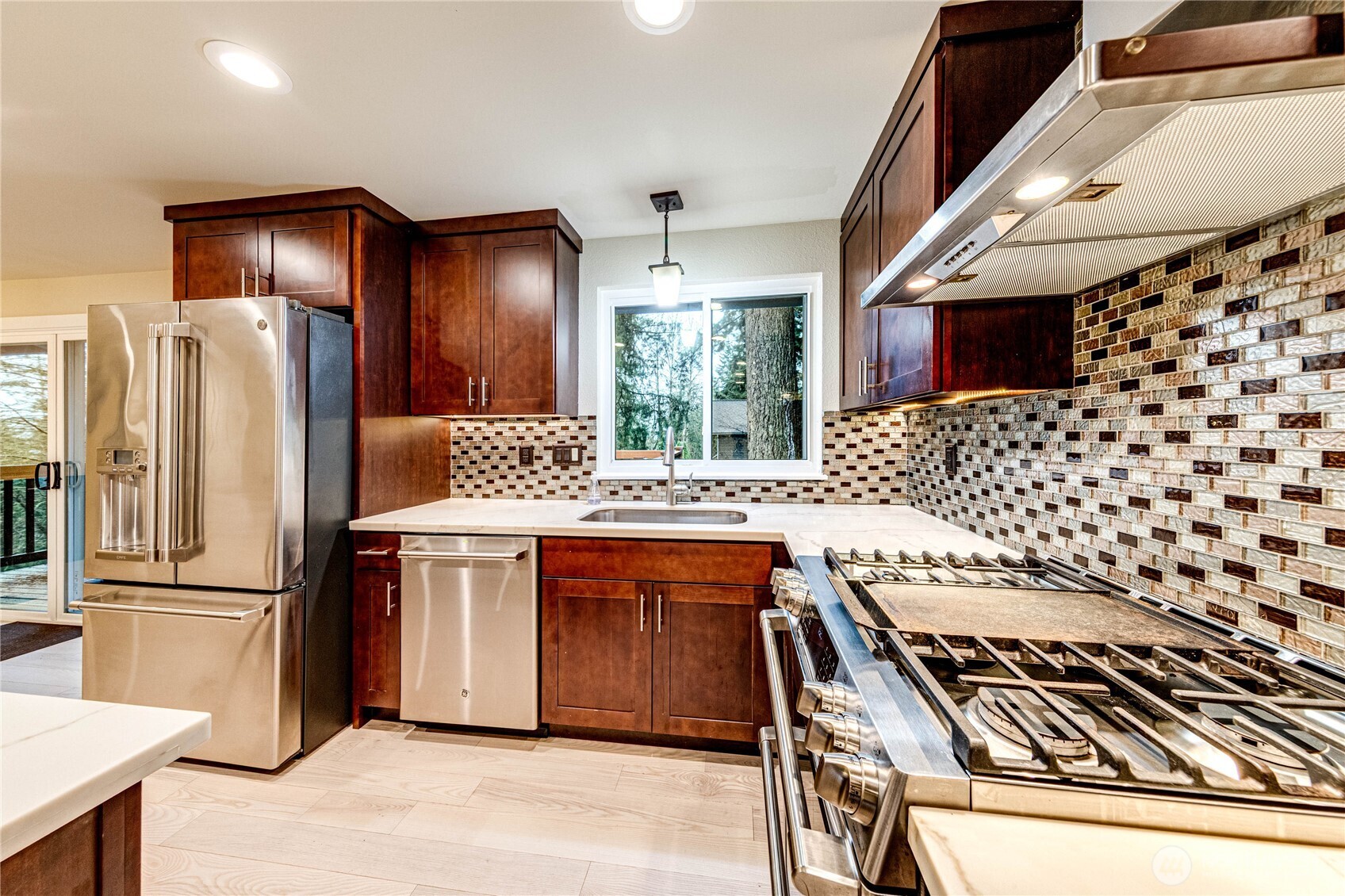 321 216th Street Southeast Bothell, WA 98021 - Photo 8 of 33 a kitchen with a sink appliances and cabinets