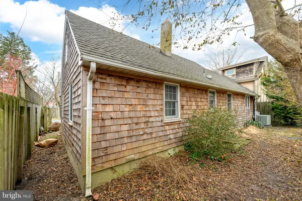 a front view of a house with a garage