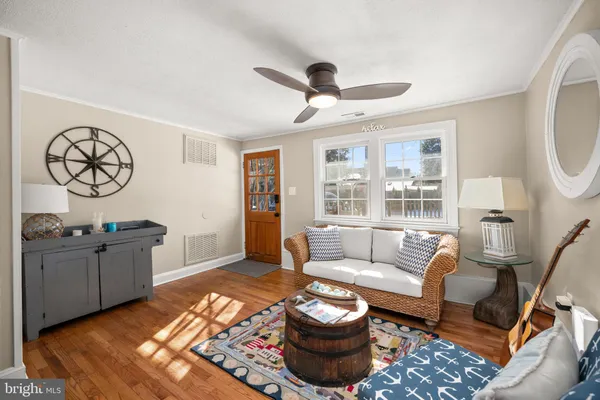 a living room with furniture and a rug