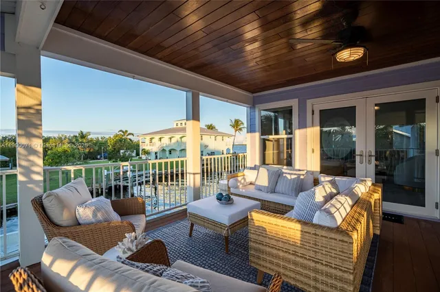an aerial view of a house with a garden and yard
