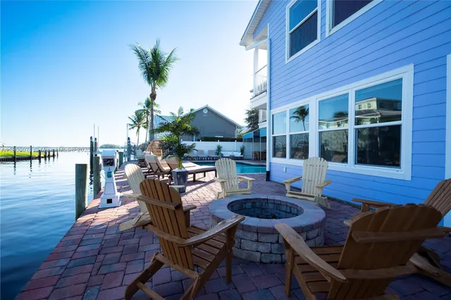 a front view of a house with swimming pool