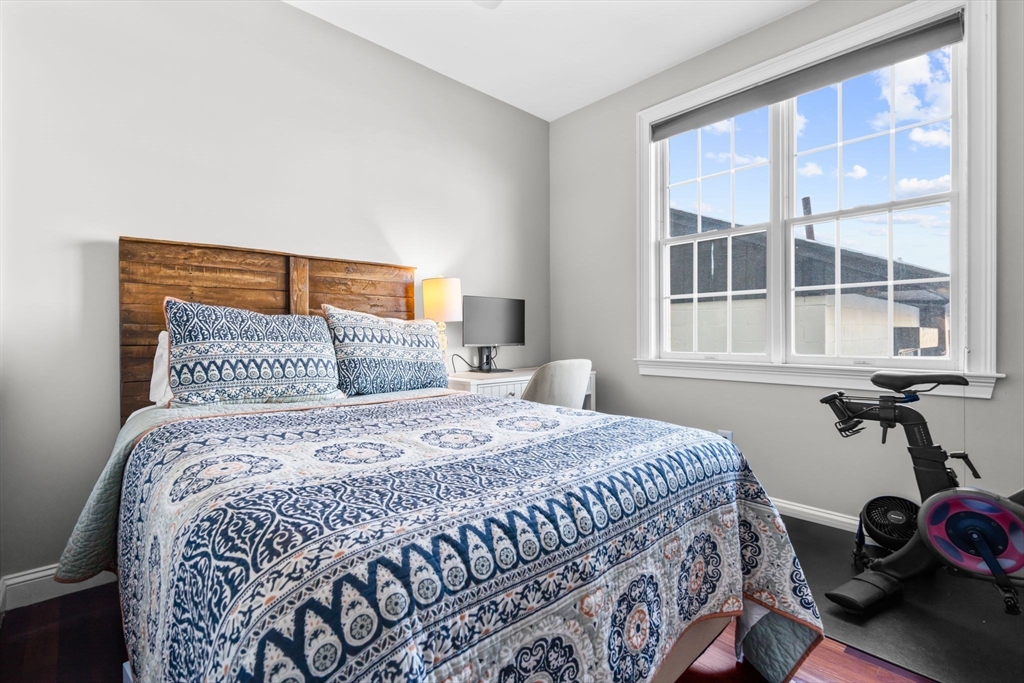 34 H Street, Unit 2L Boston, MA 02127 - Photo 8 of 20 a bedroom with a bed and a window