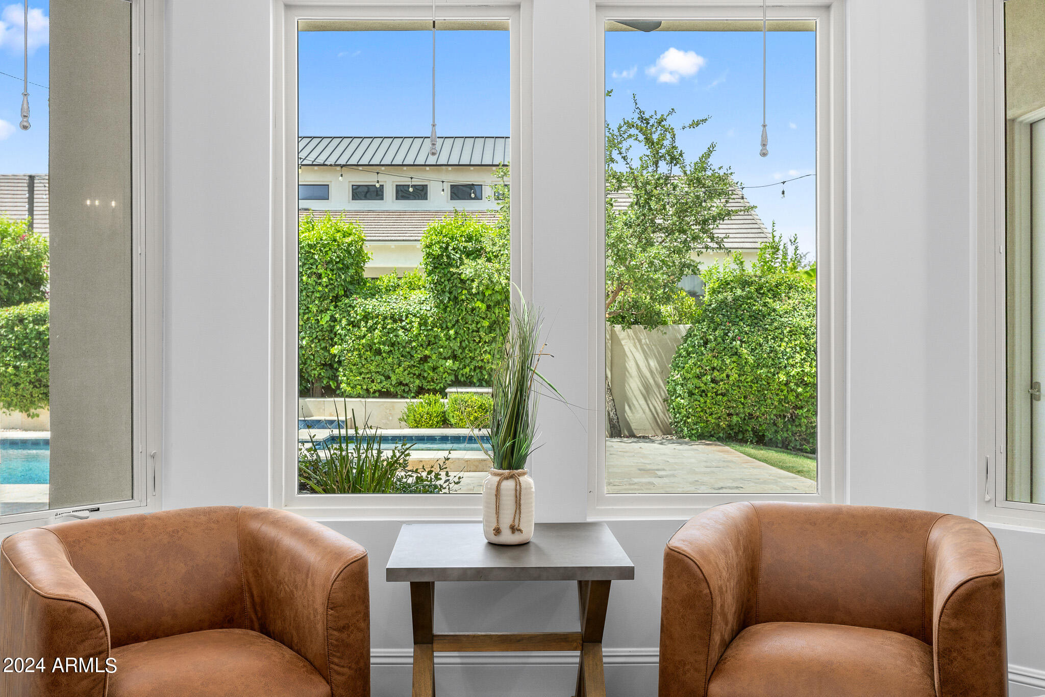 2654 East Warbler Road Gilbert, AZ 85297 - Photo 24 of 50 a living room with furniture and a window