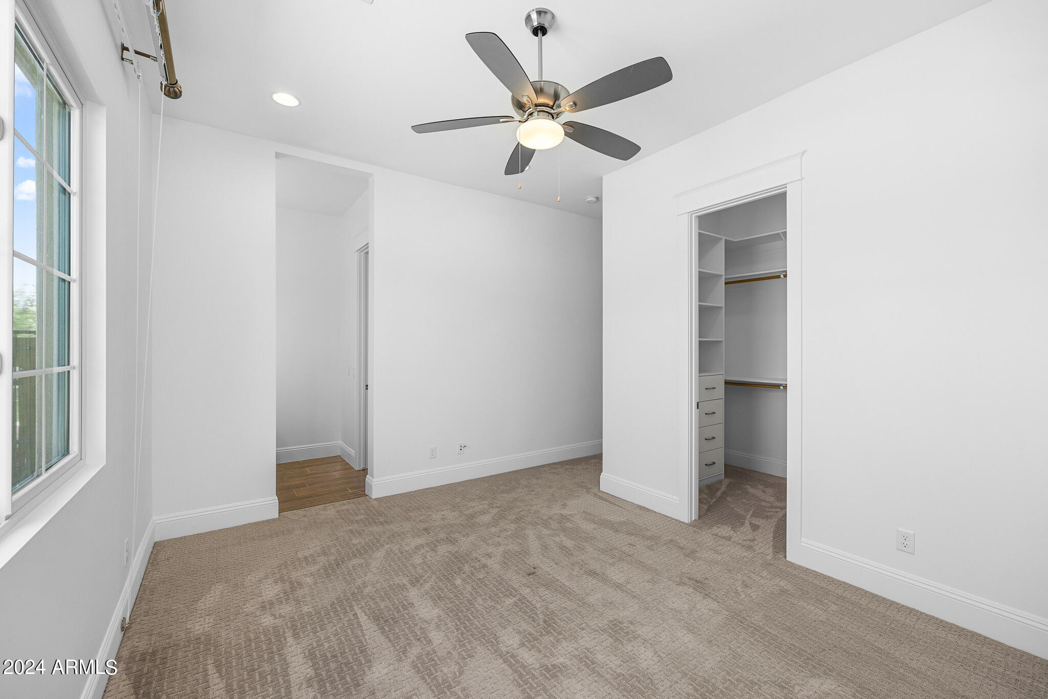 2654 East Warbler Road Gilbert, AZ 85297 - Photo 33 of 50 a view of an empty room with a window