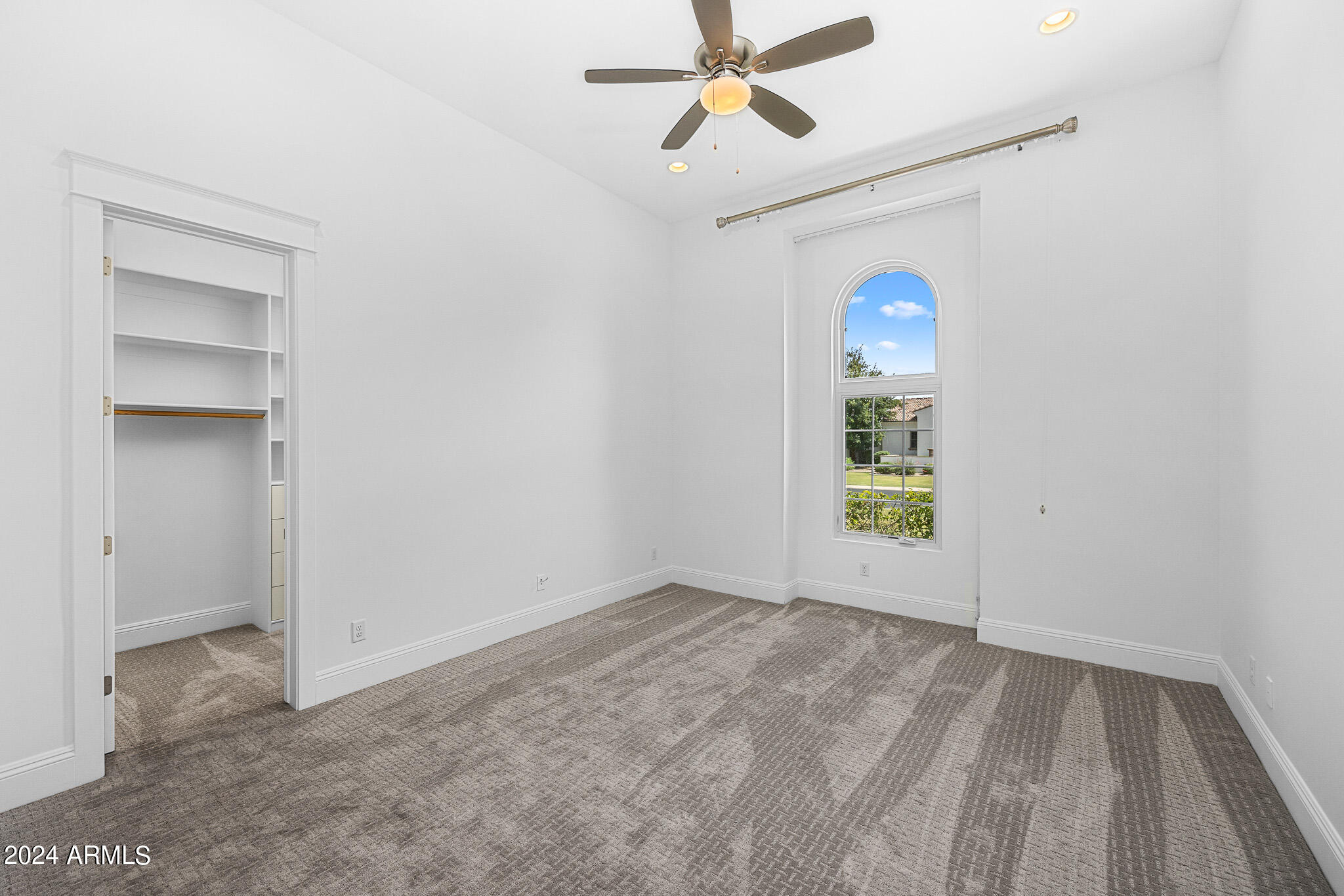 2654 East Warbler Road Gilbert, AZ 85297 - Photo 34 of 50 a view of an empty room with a window