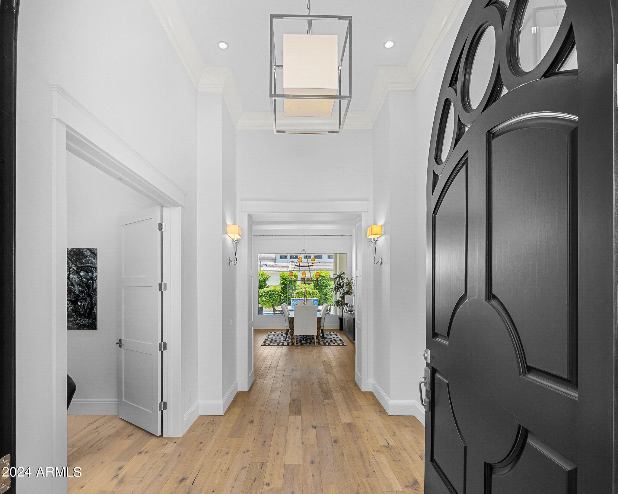 2654 East Warbler Road Gilbert, AZ 85297 - Photo 4 of 50 a view of entryway with wooden floor