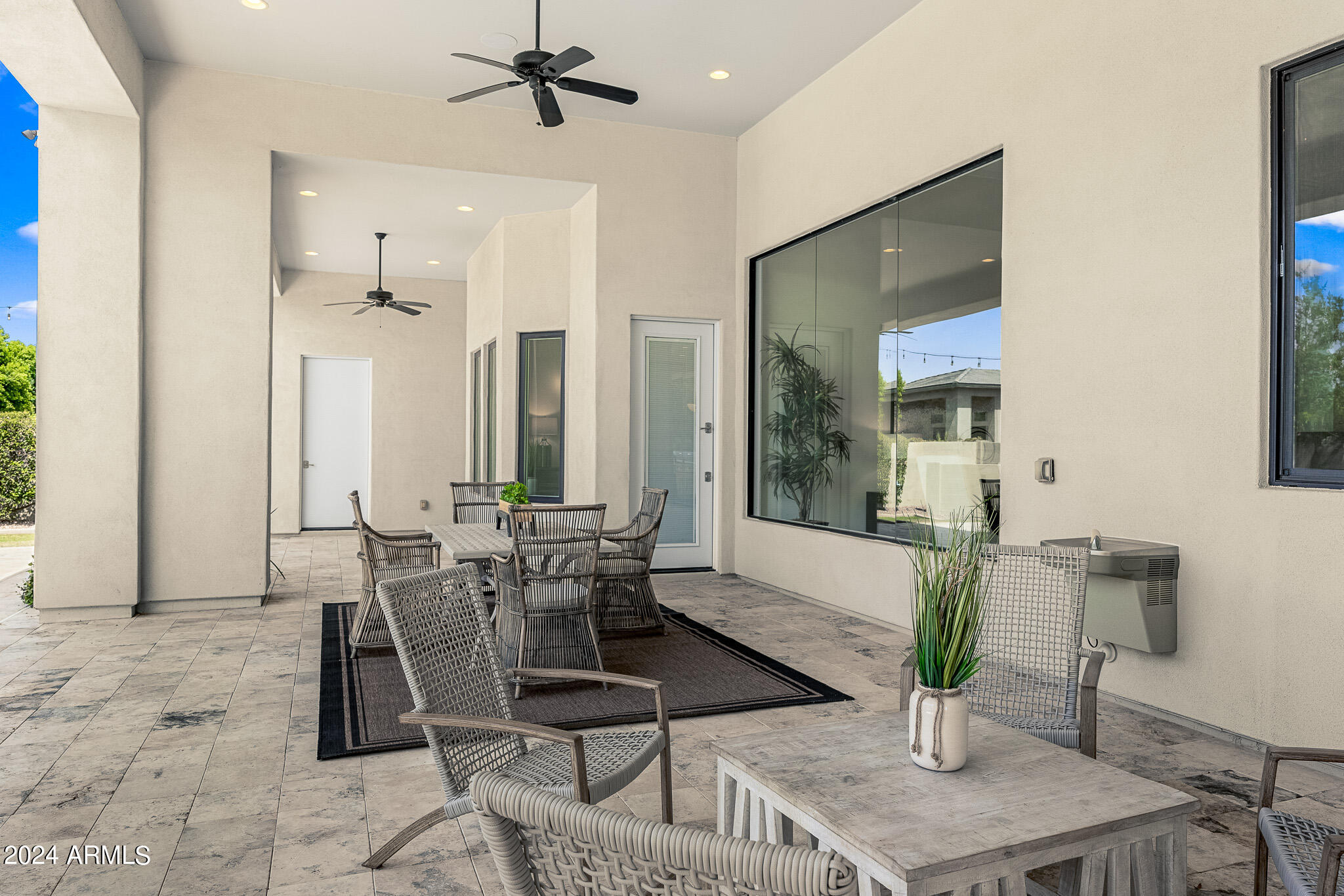 2654 East Warbler Road Gilbert, AZ 85297 - Photo 43 of 50 a view of a livingroom with furniture and a table