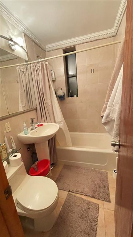 153 Bay 26th Street, Unit 1A Brooklyn, NY 11214 - Photo 6 of 6 a bathroom with a sink toilet and shower