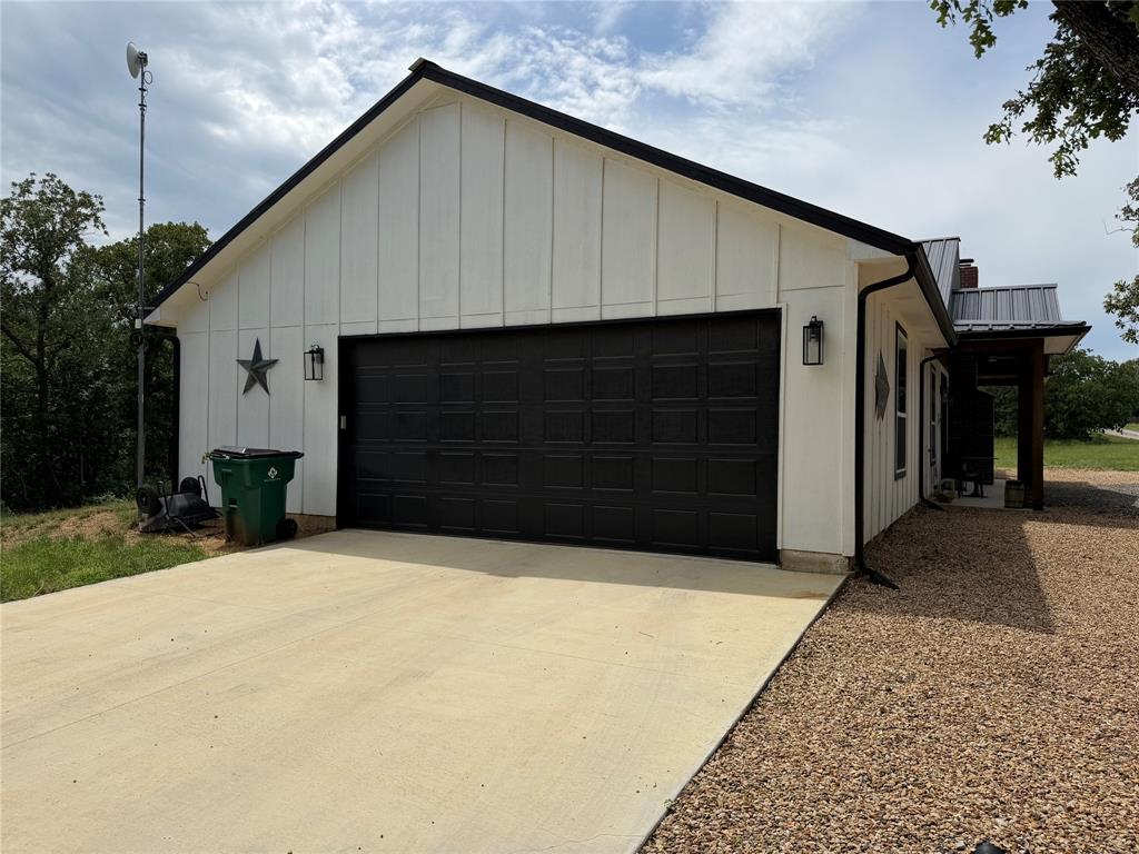 129 Whiskey Rnch Road Runaway Bay, TX 76426 - Photo 4 of 39 a front view of a house