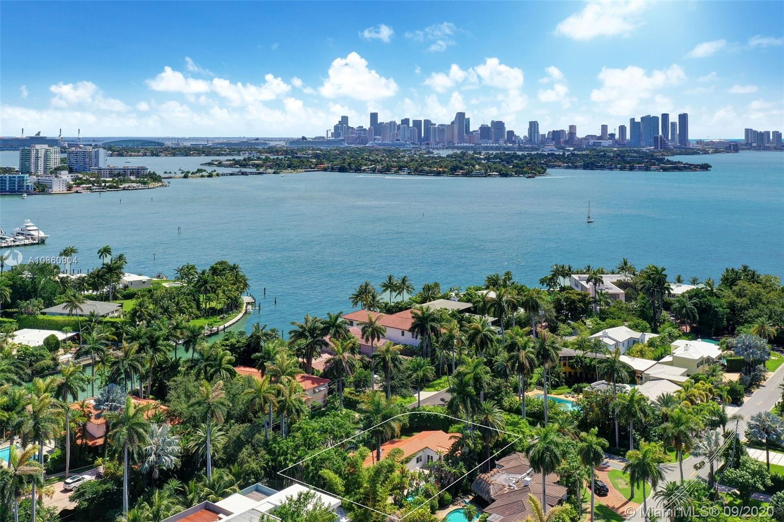 Southwest-facing aerial of Sunset Island home overlooking Venetian Islands and Downtown Miami