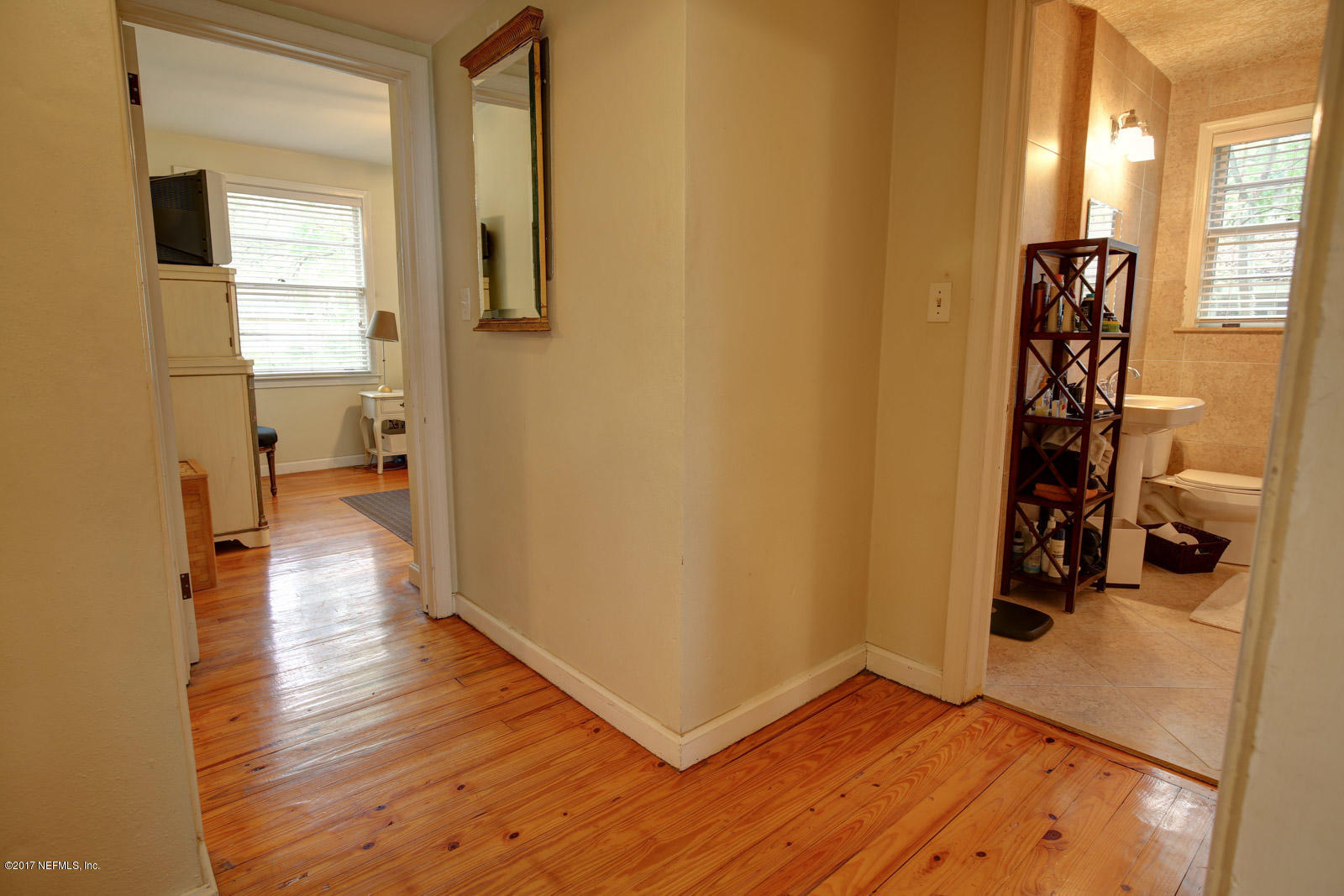 1361 Glengarry Road Jacksonville, FL 32207 - Photo 13 of 22 a view of a hallway with wooden floor and closet