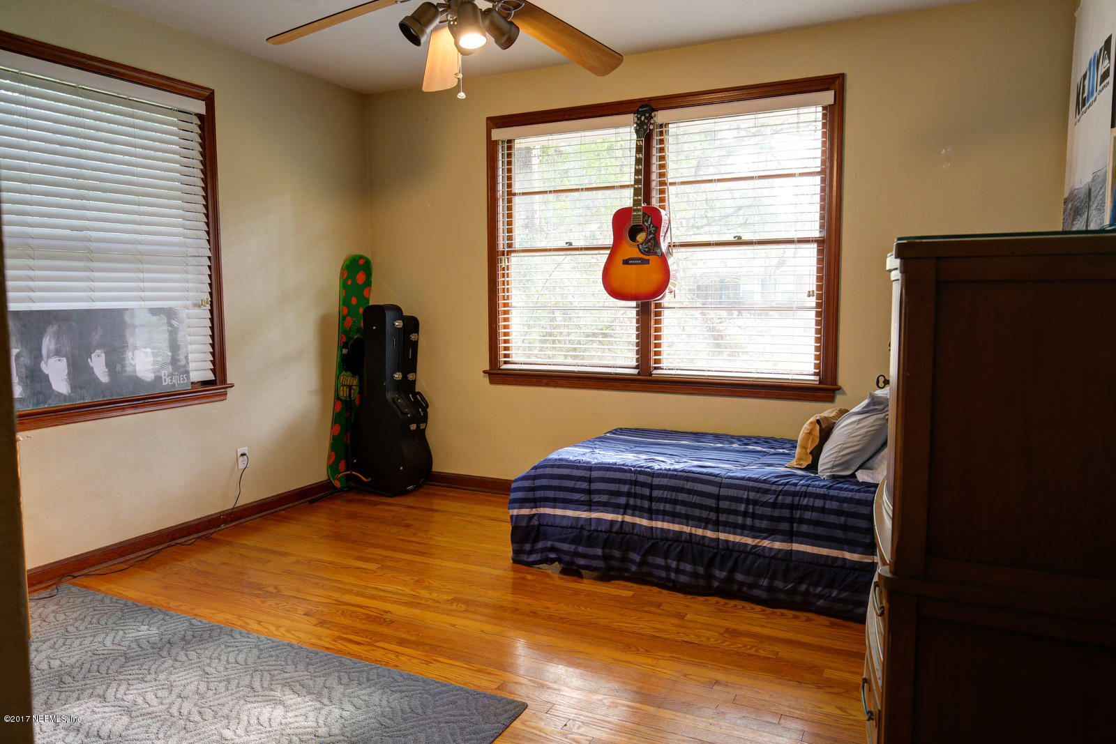 1361 Glengarry Road Jacksonville, FL 32207 - Photo 17 of 22 a room with a bed and a window