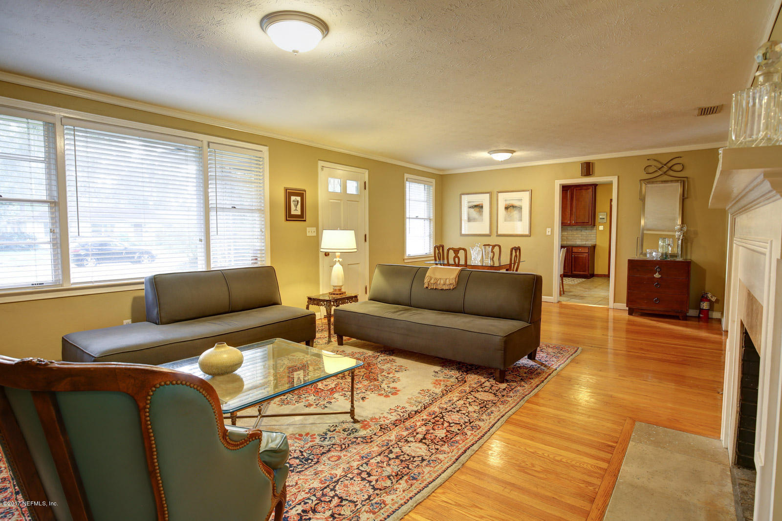 1361 Glengarry Road Jacksonville, FL 32207 - Photo 4 of 22 a living room with furniture and a large window