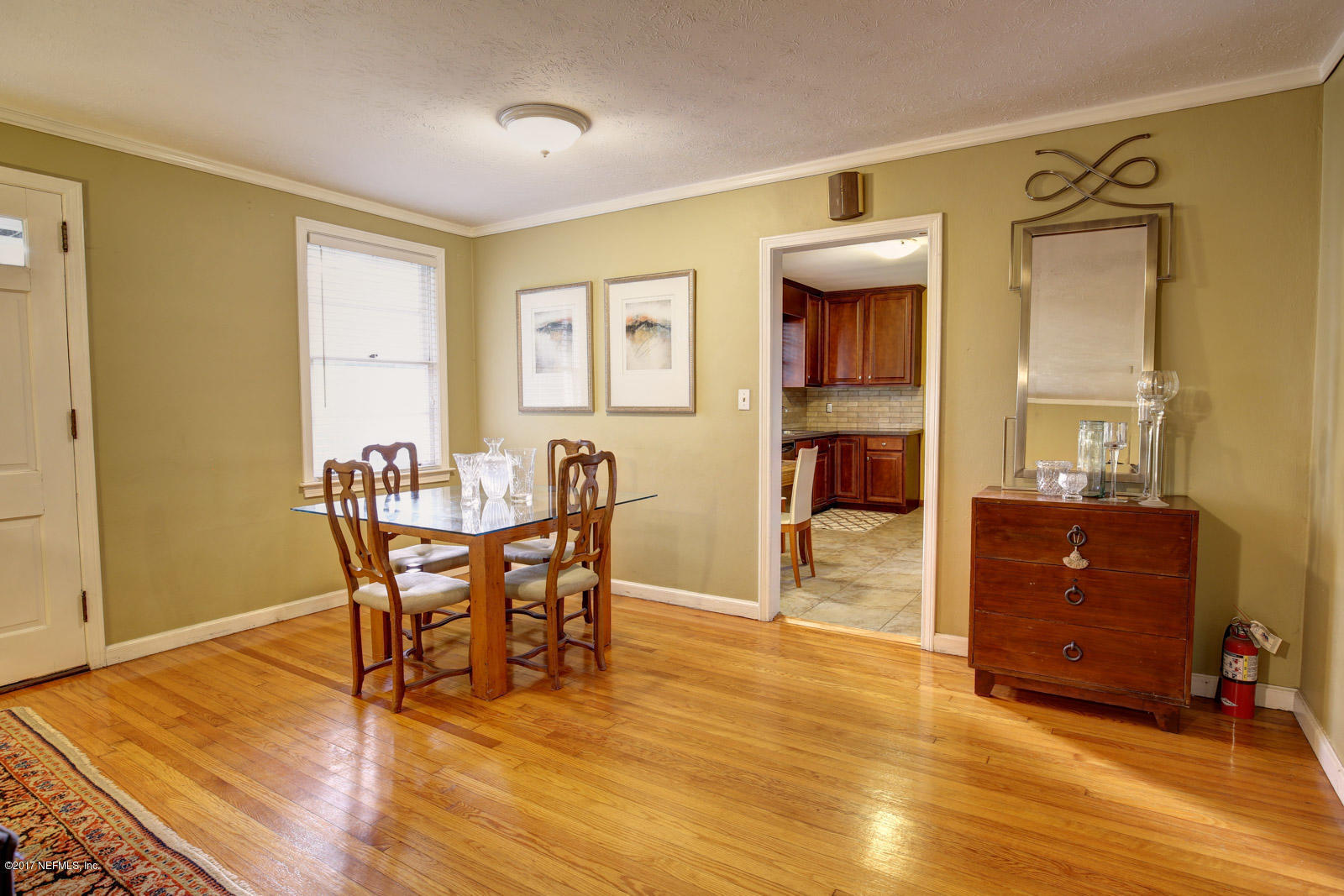 1361 Glengarry Road Jacksonville, FL 32207 - Photo 5 of 22 a view of a dining room with furniture and wooden floor