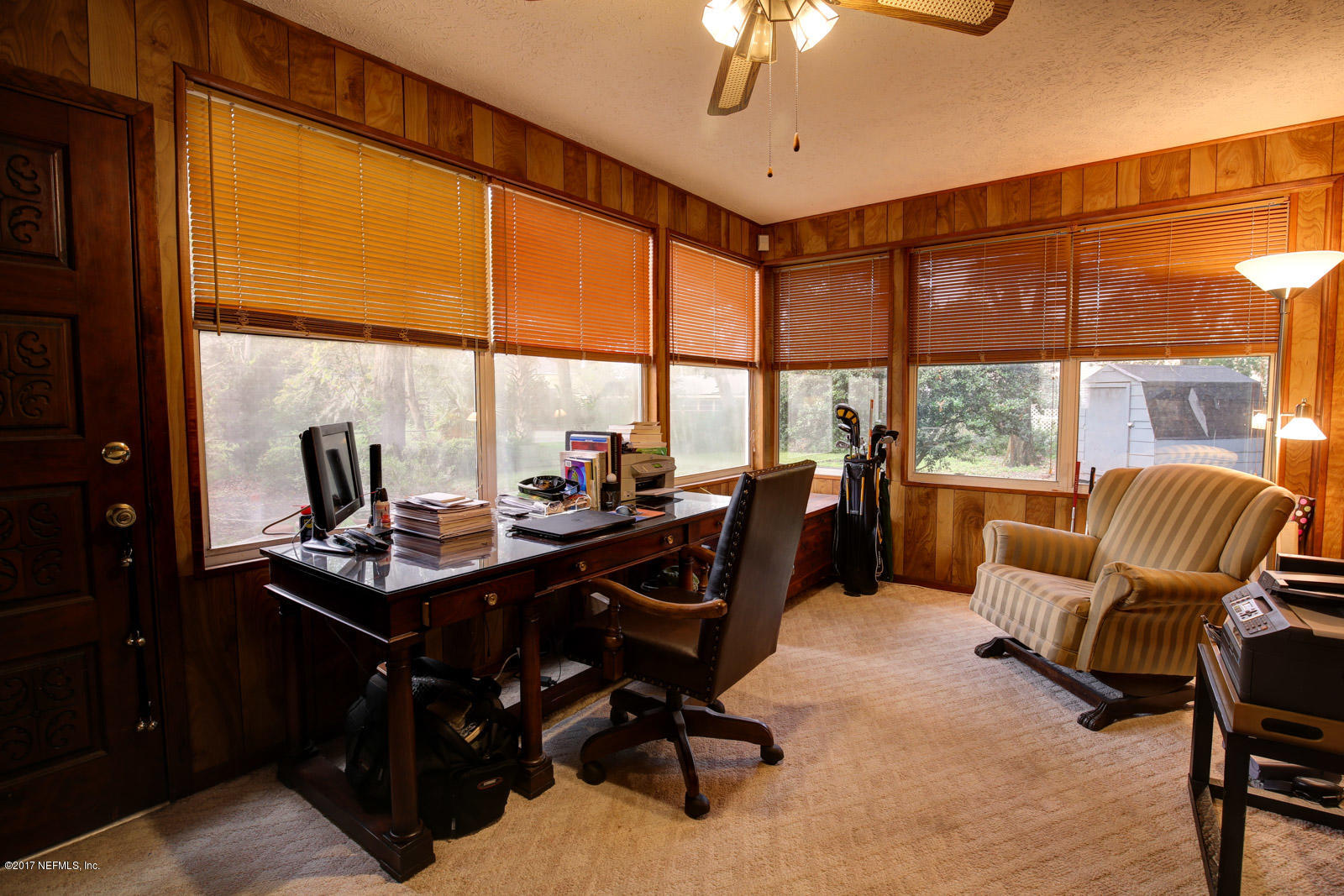 1361 Glengarry Road Jacksonville, FL 32207 - Photo 8 of 22 a view of a workspace with furniture and a window