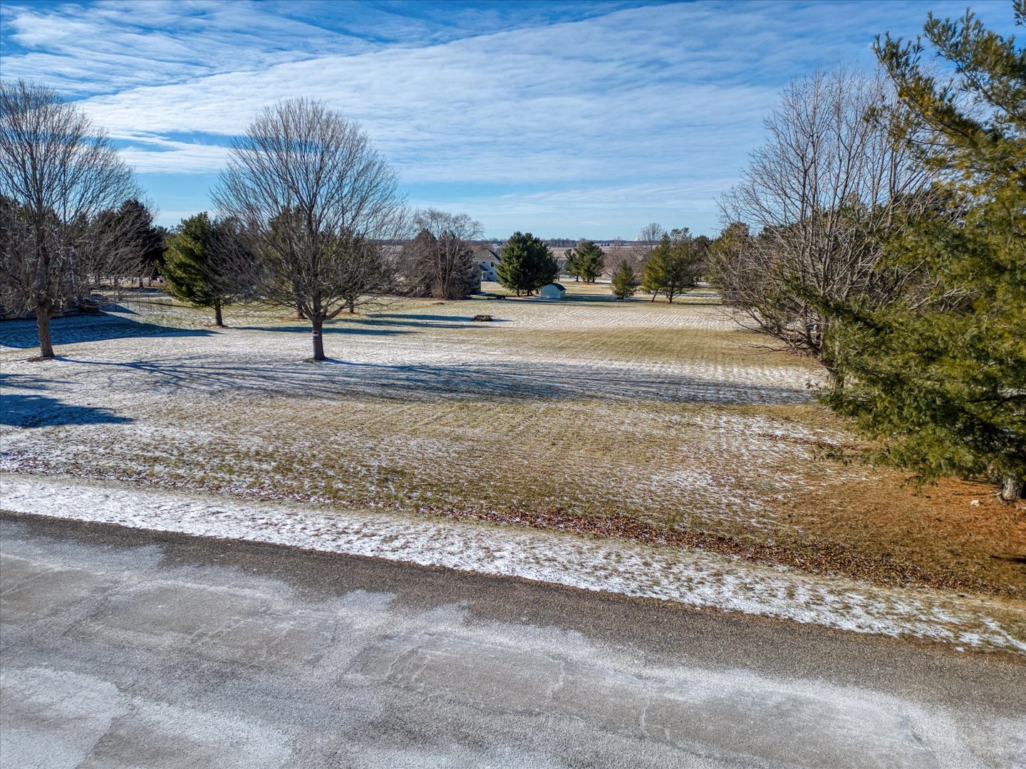 Lot 45 East Pine Circle Genoa, IL 60135 - Photo 11 of 16 a view of a yard with a house