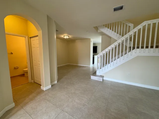 a view of an entryway with staircase