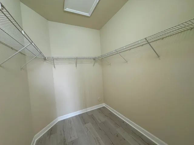 a bathroom with a shower and toilet