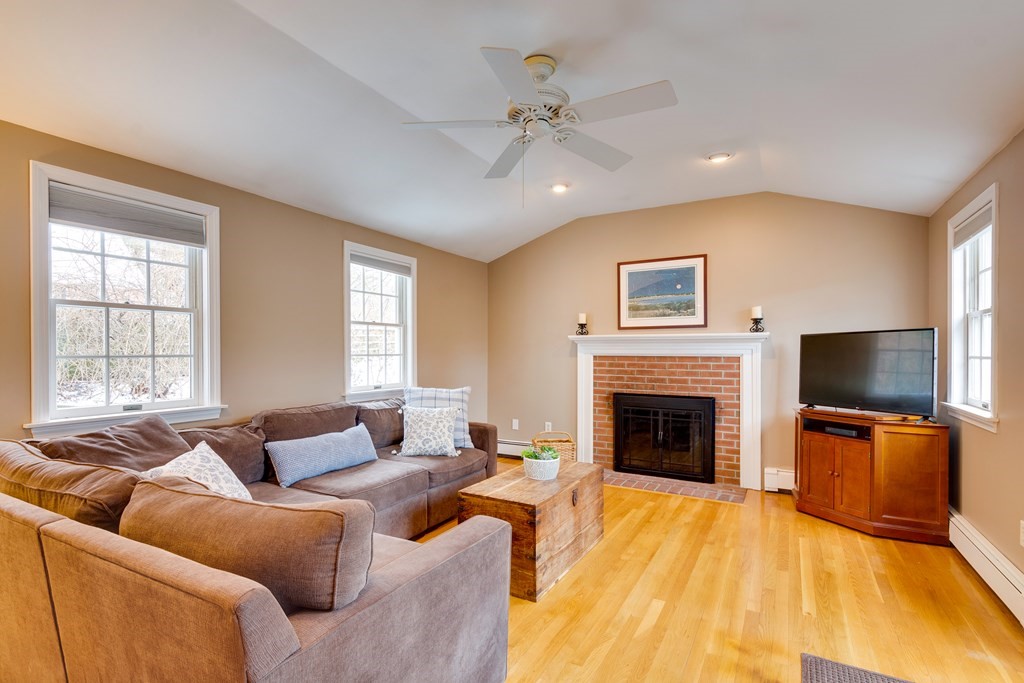 64 Grosvenor Road Needham, MA 02492 - Photo 18 of 36 a living room with furniture fireplace and window