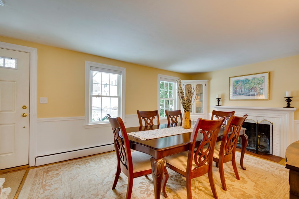 64 Grosvenor Road Needham, MA 02492 - Photo 2 of 36 a dining room with furniture and window