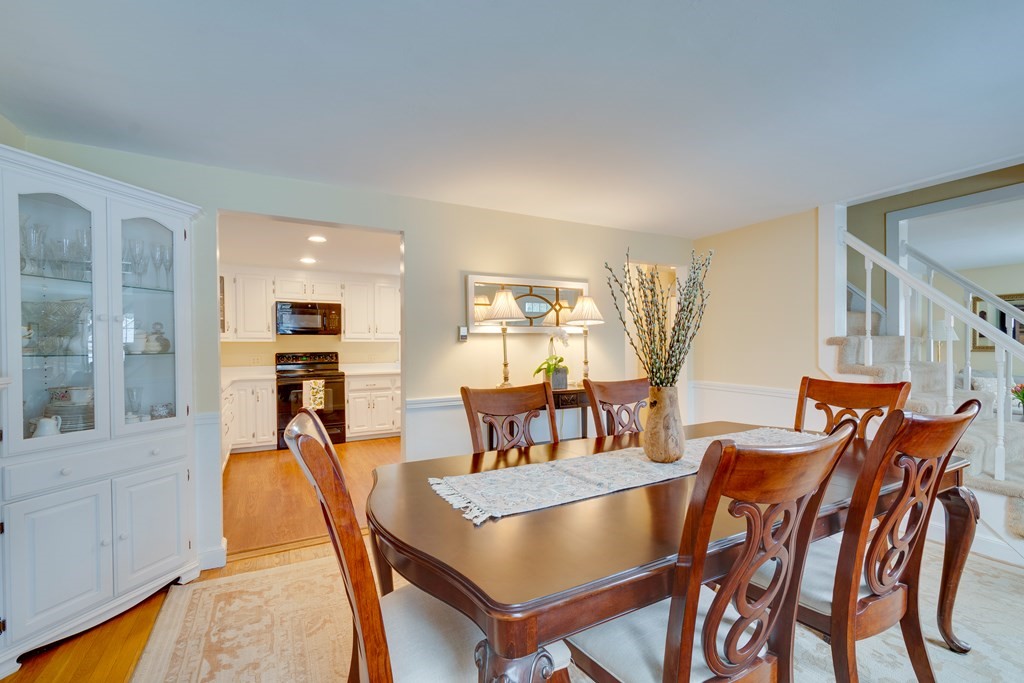 64 Grosvenor Road Needham, MA 02492 - Photo 4 of 36 a view of a dining room with furniture and a table