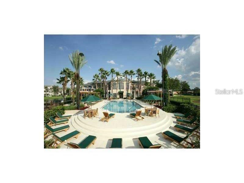 5017 City Street, Unit 1933 Orlando, FL 32839 - Photo 12 of 12 a vase of flowers sitting on a table