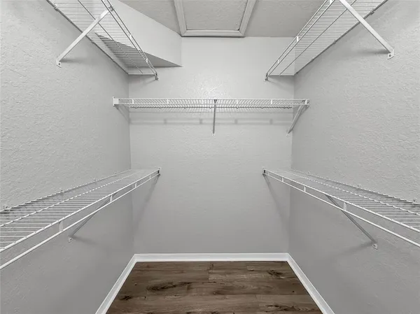 a view of a room with racks on the wall