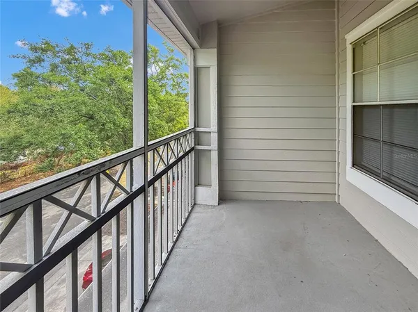 a view of a balcony with an outdoor space