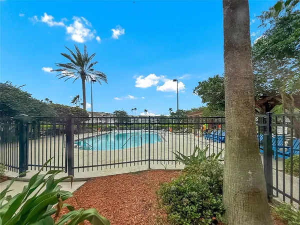 a view of a garden with houses