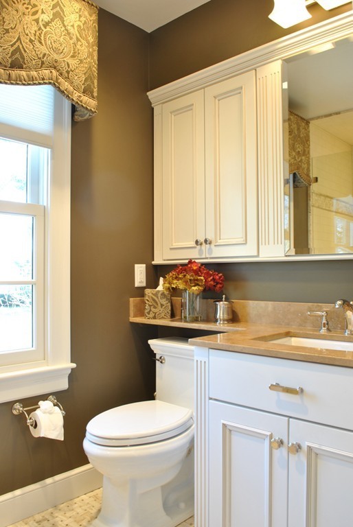 119 Crescent Road Concord, MA 01742 - Photo 11 of 18 a bathroom with a sink a toilet and a window