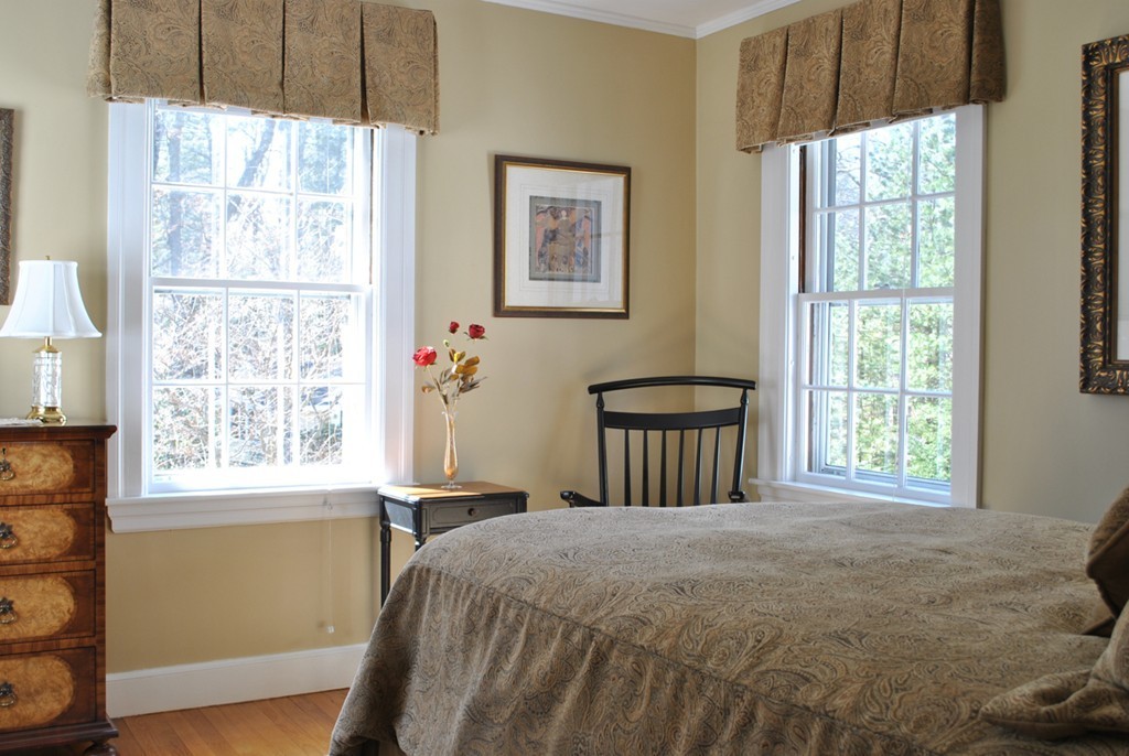 119 Crescent Road Concord, MA 01742 - Photo 15 of 18 a bedroom with a bed and a window