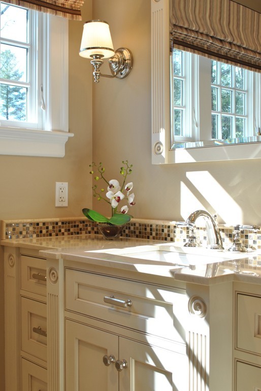 119 Crescent Road Concord, MA 01742 - Photo 16 of 18 a bathroom with a sink and a mirror