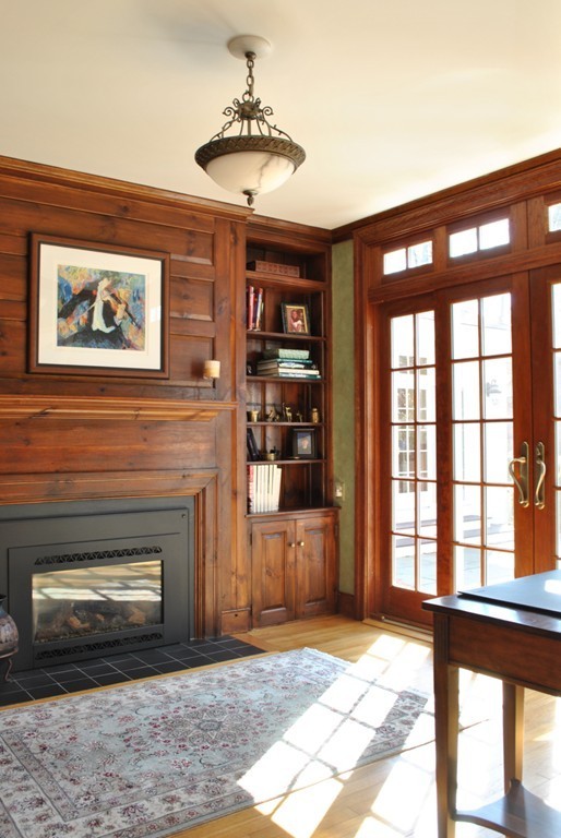 119 Crescent Road Concord, MA 01742 - Photo 9 of 18 a living room with furniture and a fireplace