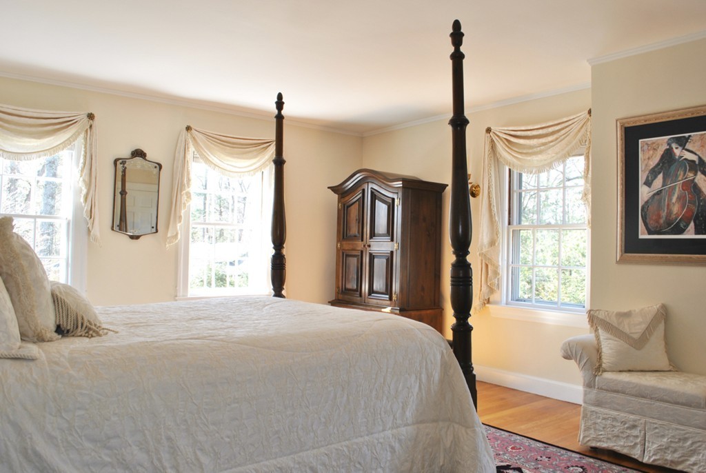 119 Crescent Road Concord, MA 01742 - Photo 10 of 18 a bedroom with a bed and a couch
