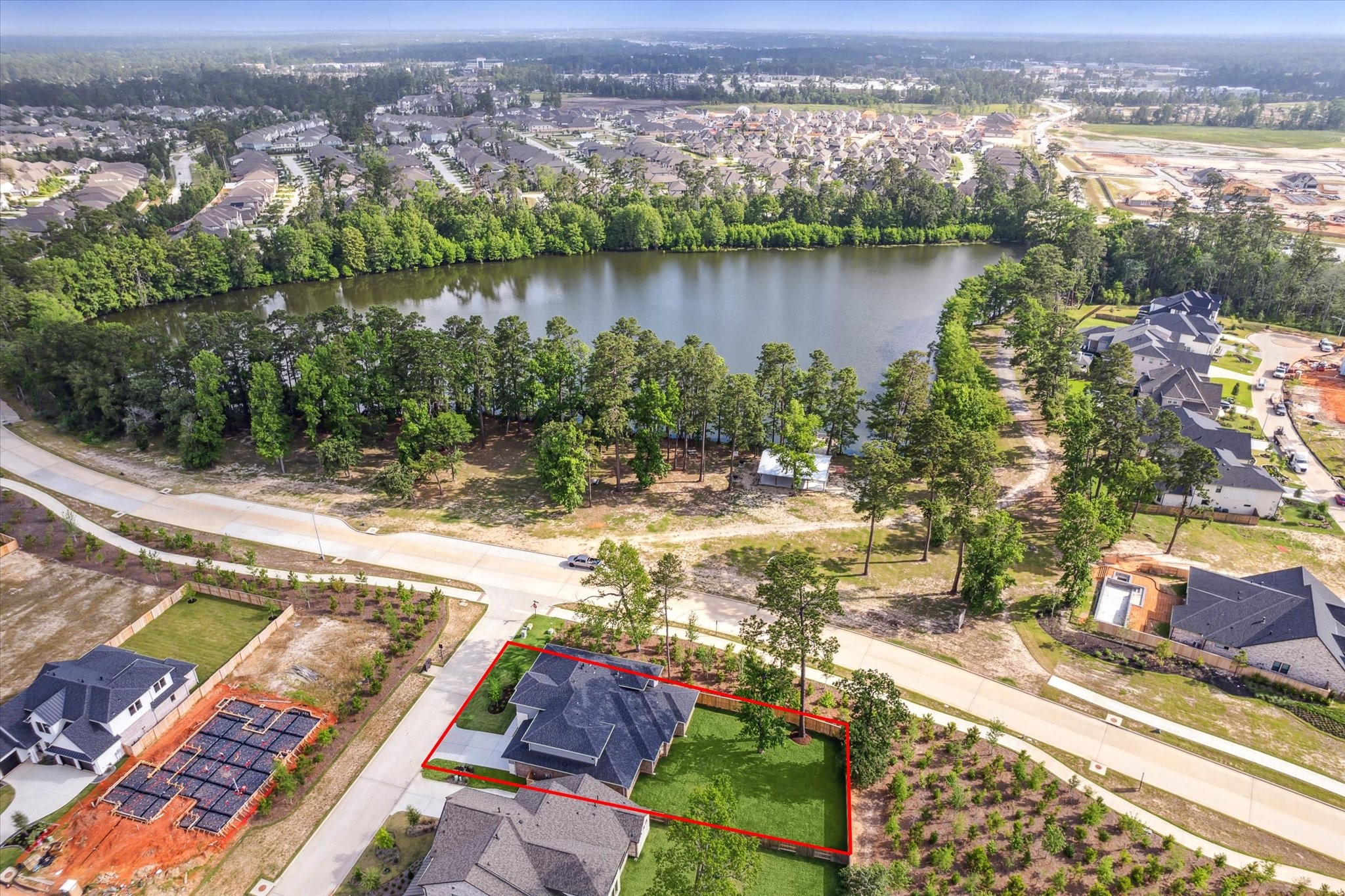 403 Venado View Court Conroe, TX 77304 - Photo 35 of 44 Steps away from Deer Lake, 403 Venado View Ct, sits on a premiere, corner lot - no neighbors to the back or north.