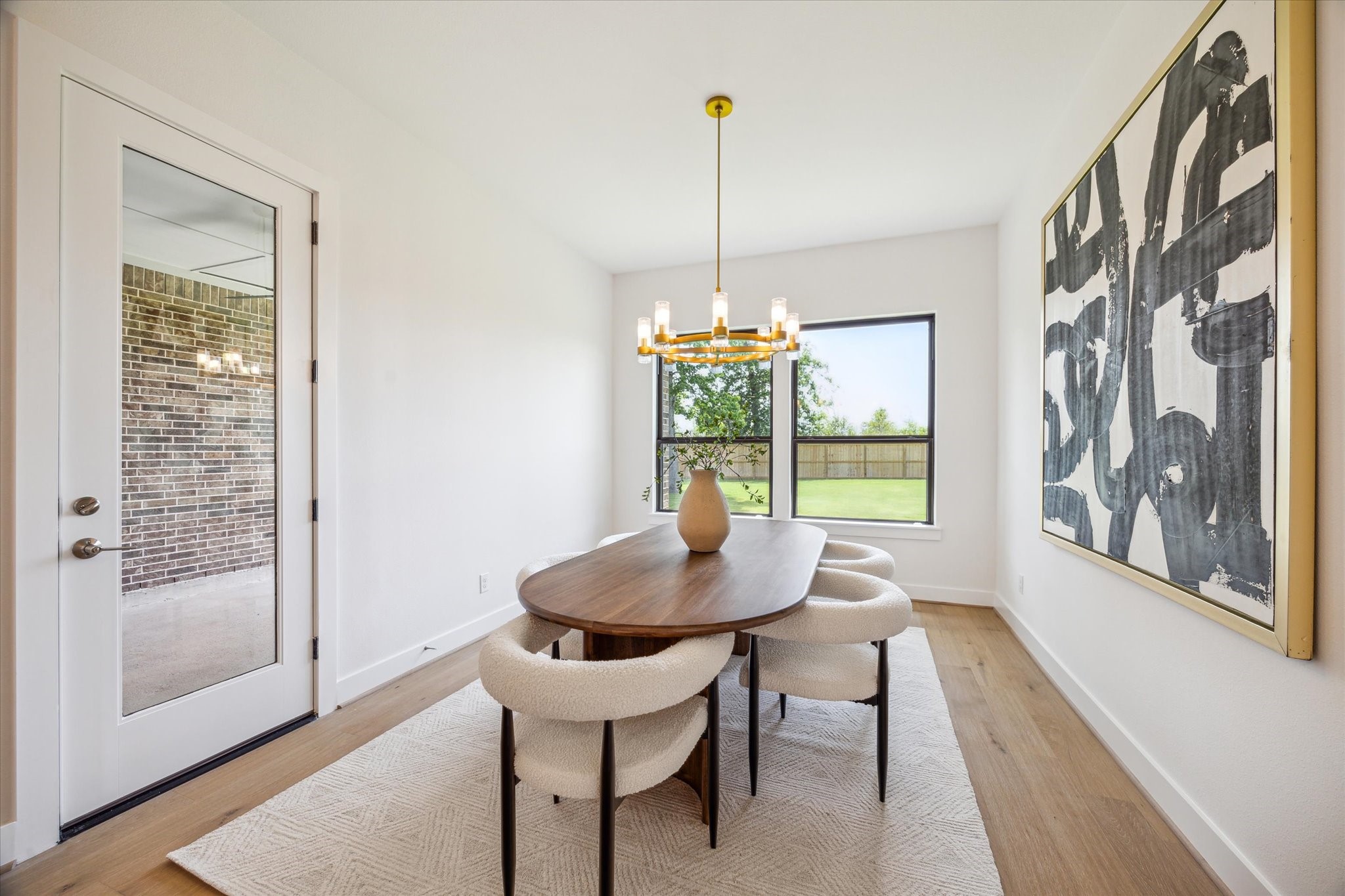 403 Venado View Court Conroe, TX 77304 - Photo 10 of 44 Dining Area, with access to Back Porch - perfect for Indoor/Outdoor Entertaining!