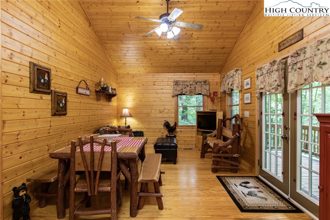 605 Wolf Pen Road Purlear, NC 28665 - Photo 11 of 50 a view of a patio with chairs and potted plants