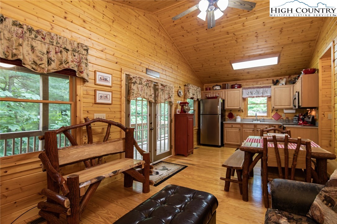 605 Wolf Pen Road Purlear, NC 28665 - Photo 16 of 50 a living room with furniture and wooden floor