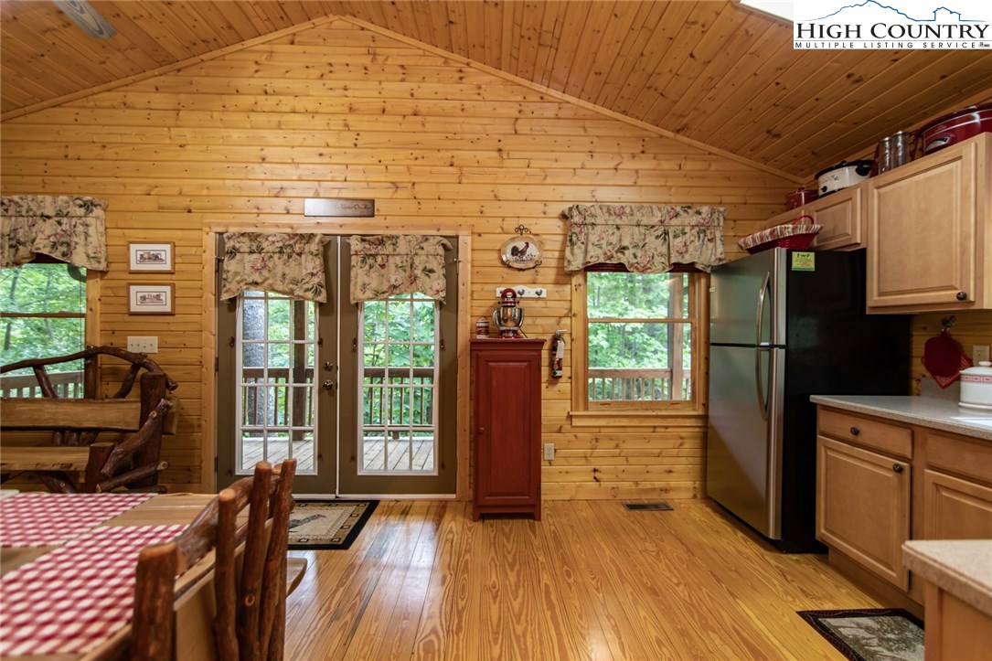 605 Wolf Pen Road Purlear, NC 28665 - Photo 17 of 50 a view of a house with wooden floor and outdoor space