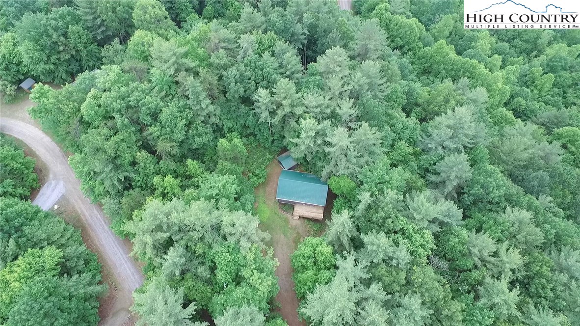 605 Wolf Pen Road Purlear, NC 28665 - Photo 2 of 50 an aerial view of a house with a yard